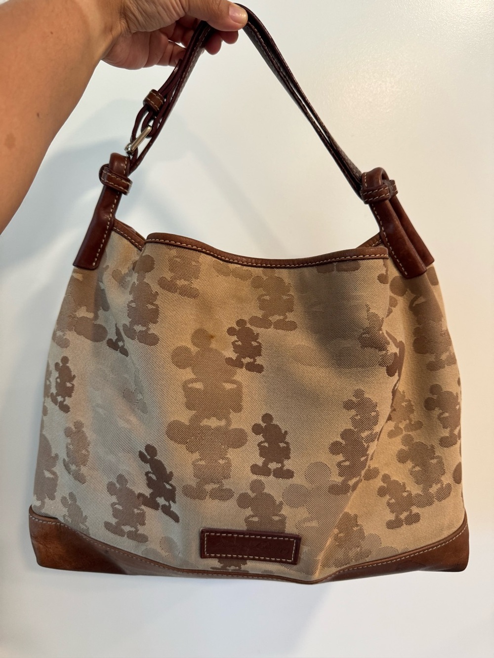 Disney Tonal Mickey Champsac Hobo Bag by Dooney & Bourke.